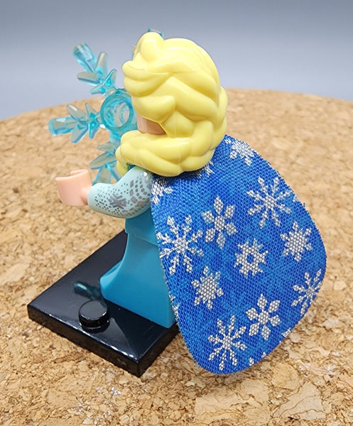 Elsa Frozen custom minifigure.    Brand new in package